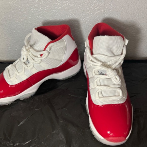 Air Jordan 11s Retro- Cherry